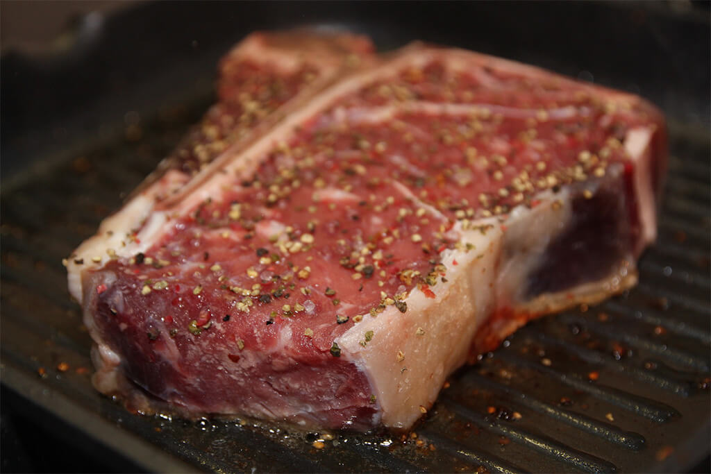 Porterhouse Steak con mantequilla de hierbas